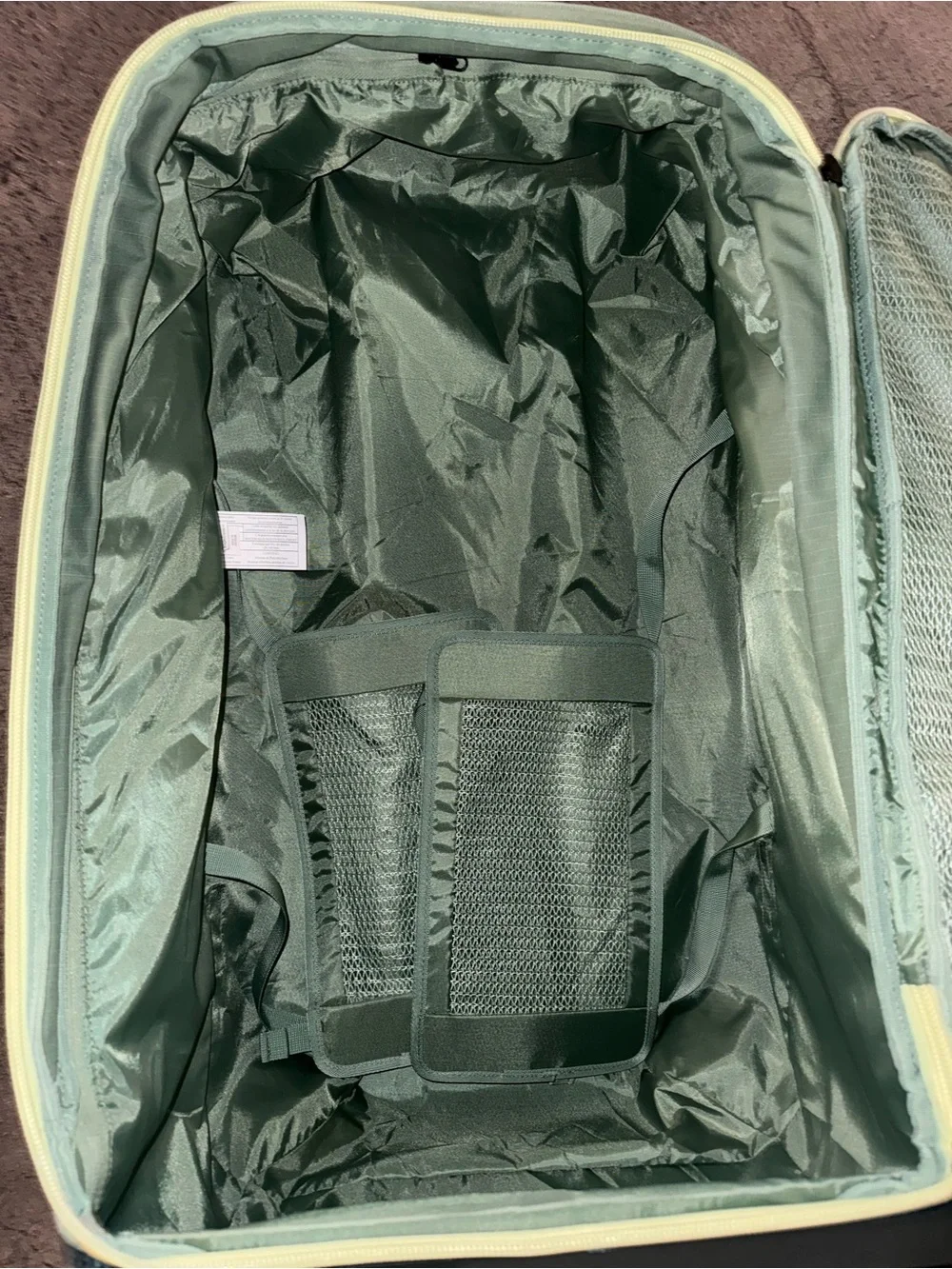 Eagle Creek Light Green Rolling Carry-On with Lime Trim Caldera 100L